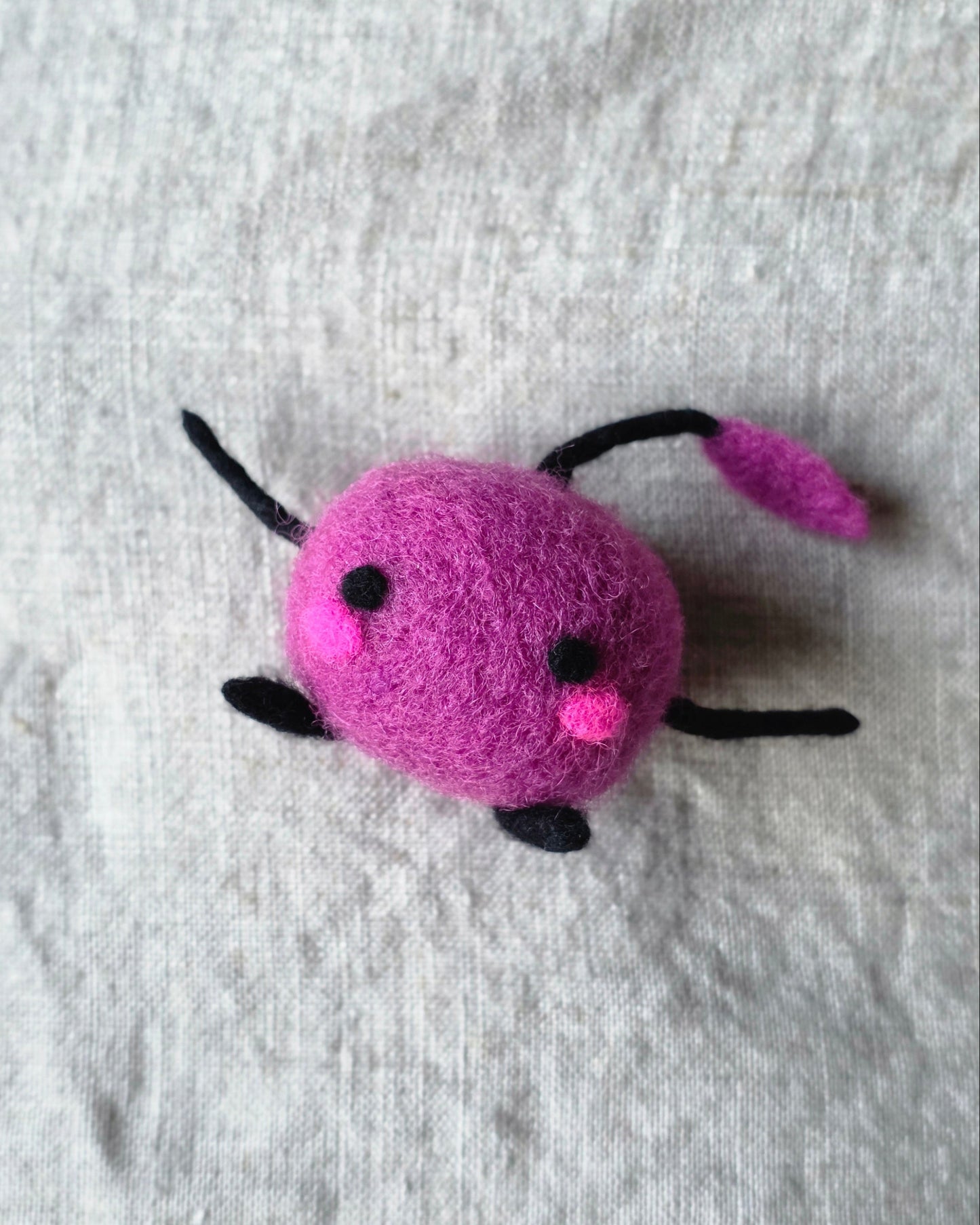 Stardew Valley inspired, this adorable felted Junimo is the perfect desk companion.